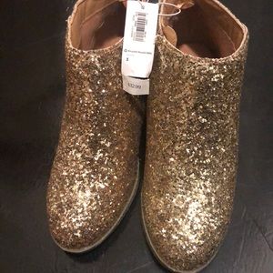 Brand new gold glitter shoes.